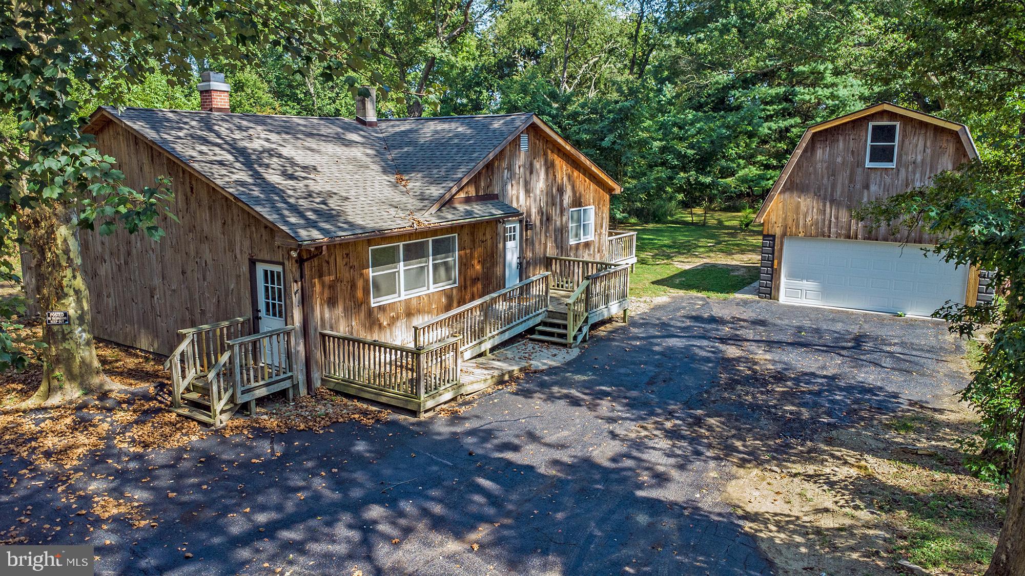 78 North Hook Road Pennsville, NJ 08070 - Photo 23 of 26 a view of a house with a yard