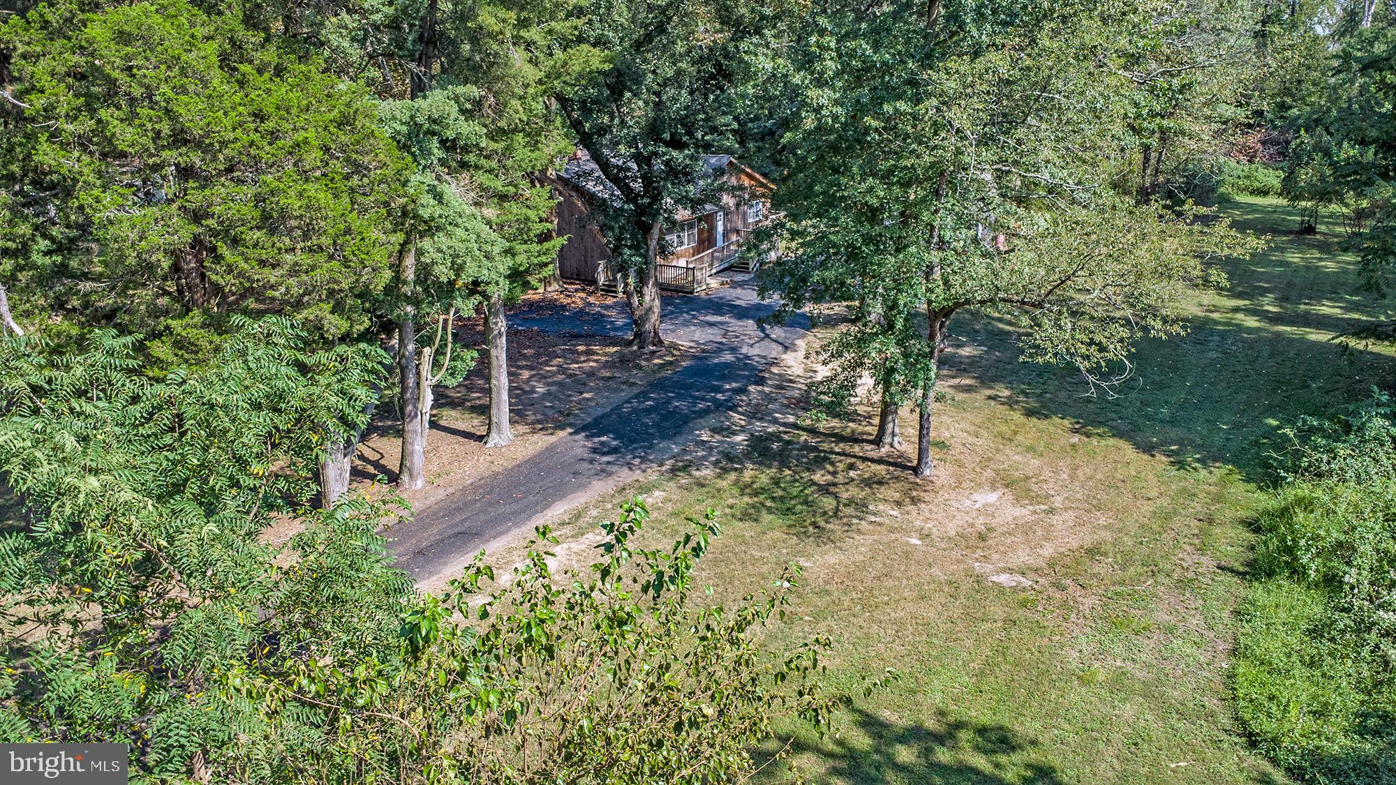 78 North Hook Road Pennsville, NJ 08070 - Photo 25 of 26 a backyard of a house with lots of green space
