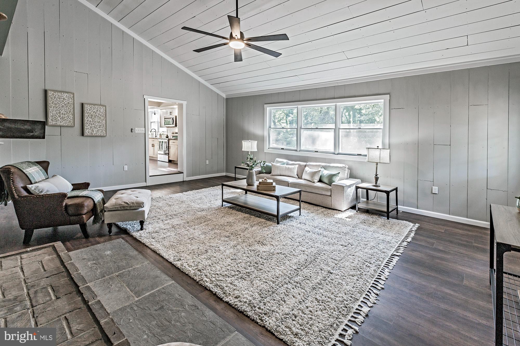 78 North Hook Road Pennsville, NJ 08070 - Photo 9 of 26 a living room with furniture and a window