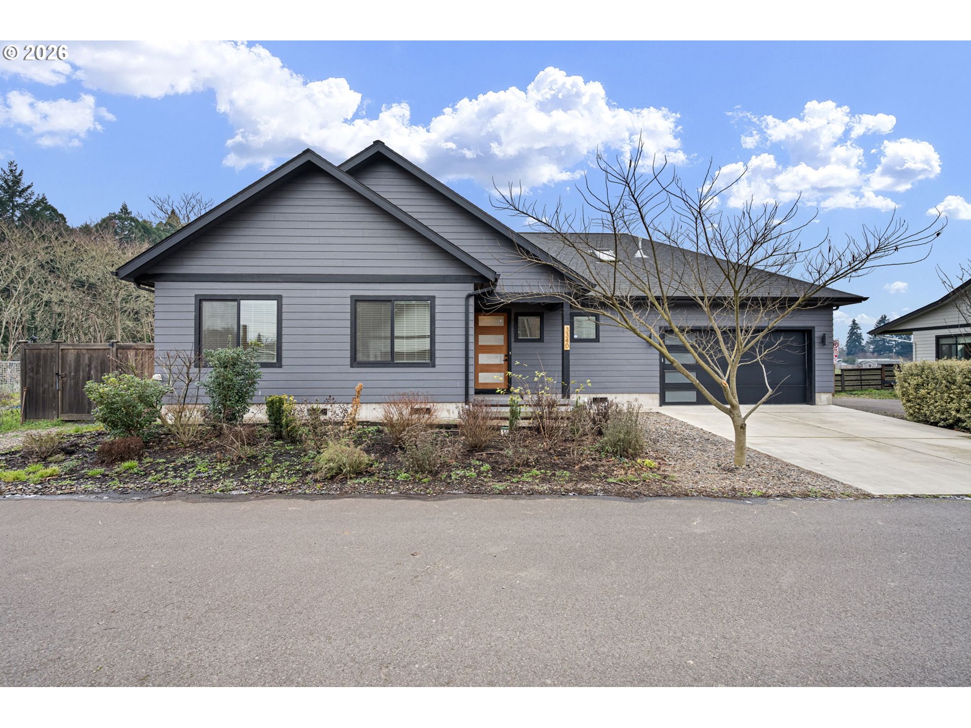 3340 Zane Lane Eugene, OR 97404 - Photo 1 of 37 a view of a house with a yard