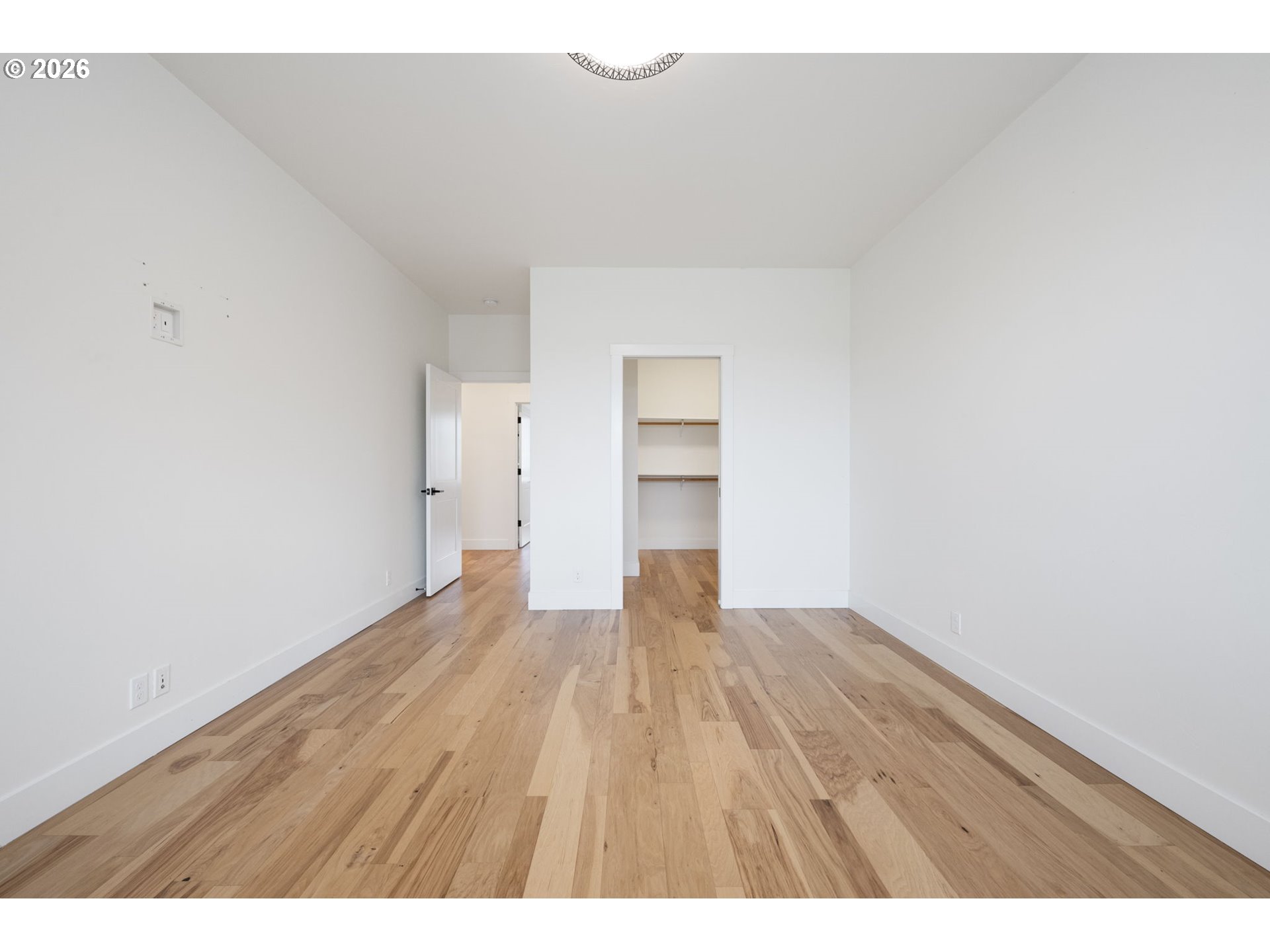 3340 Zane Lane Eugene, OR 97404 - Photo 13 of 37 a view of an empty room and wooden floor