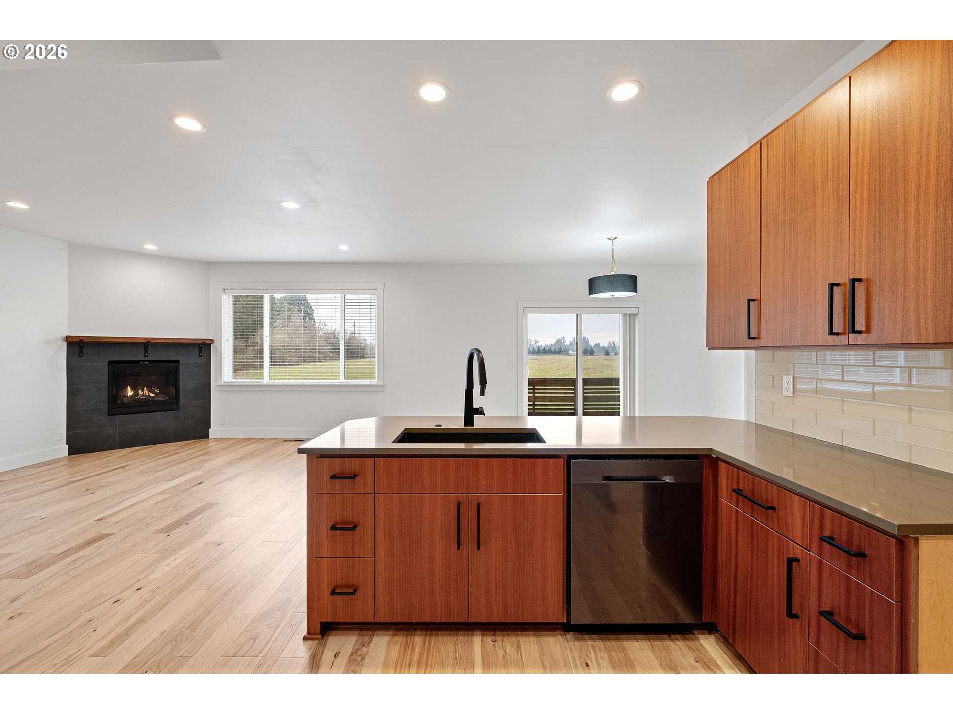 3340 Zane Lane Eugene, OR 97404 - Photo 24 of 37 a kitchen with a sink cabinets and wooden floor