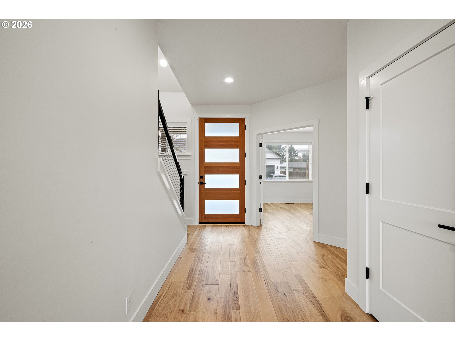 3340 Zane Lane Eugene, OR 97404 - Photo 25 of 37 a view of an empty room with wooden floor and a window