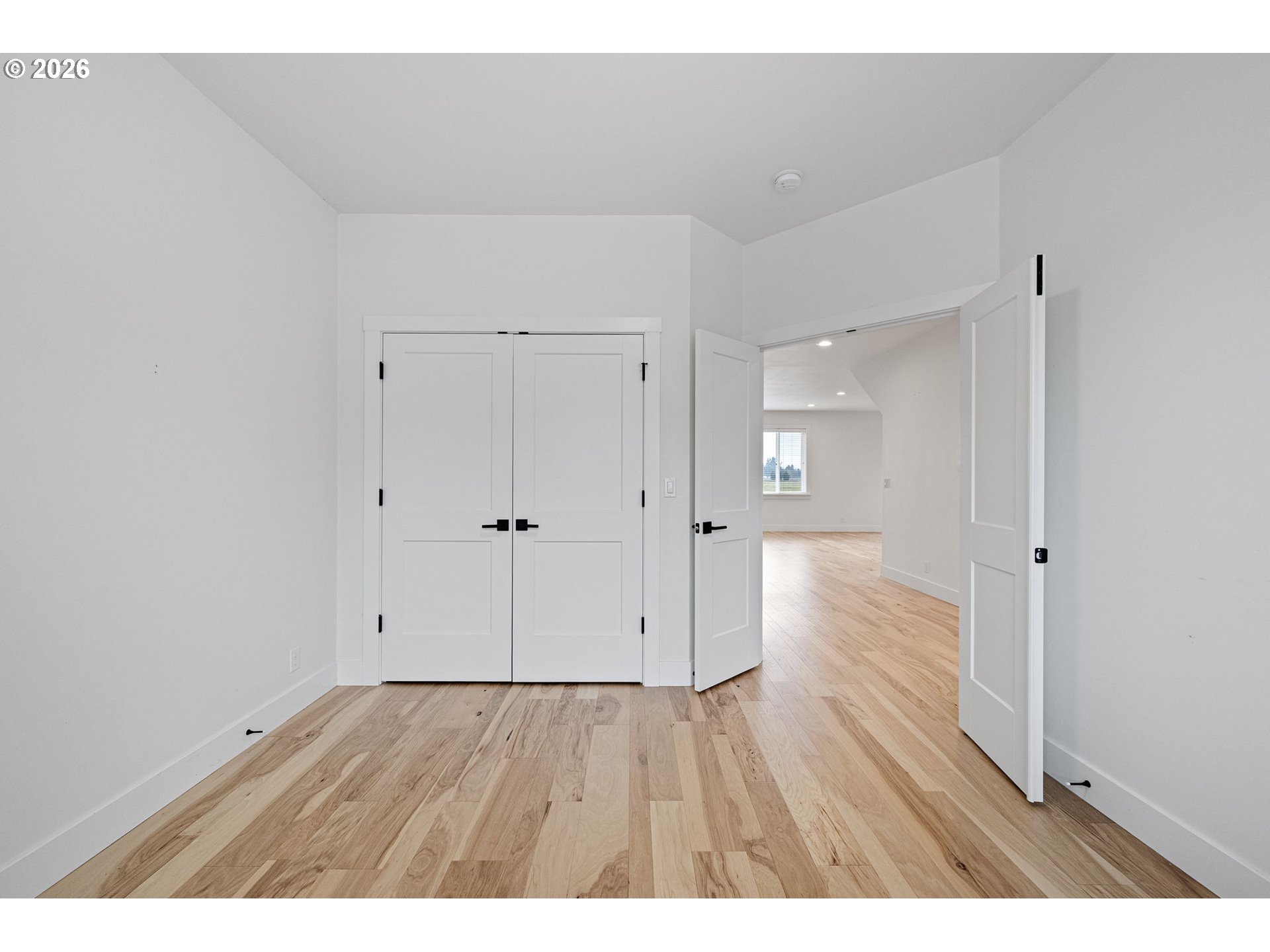 3340 Zane Lane Eugene, OR 97404 - Photo 10 of 37 a view of an empty room and wooden floor