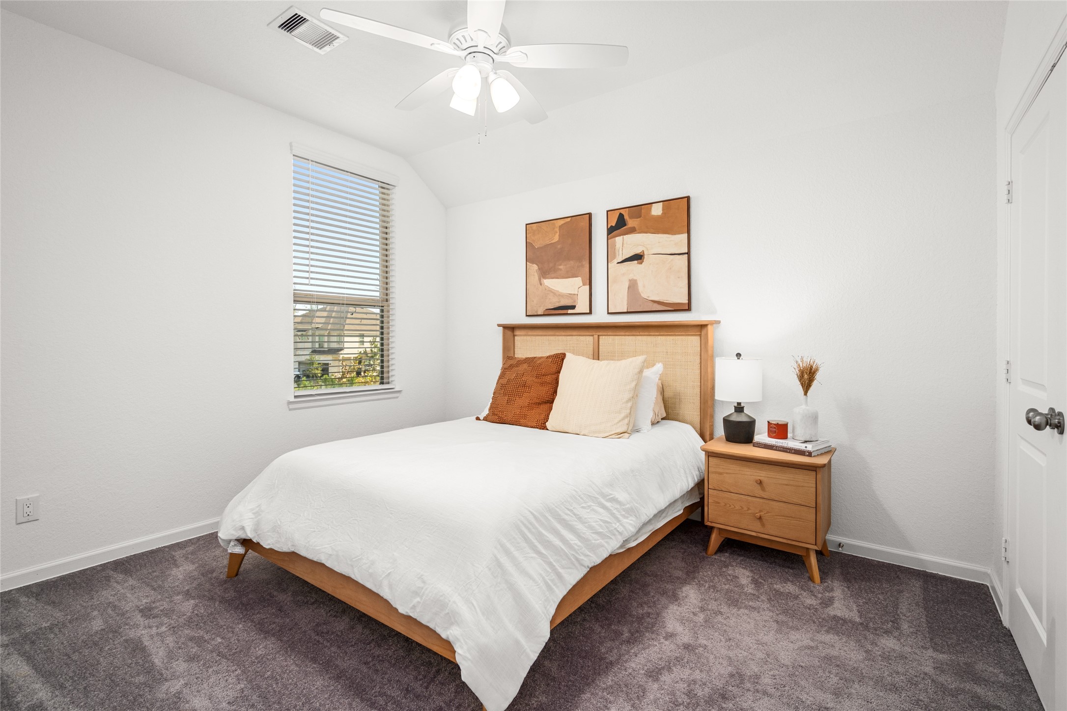 575 Dry Fork Lane Conroe, TX 77304 - Photo 20 of 34 Comfortable and inviting third bedroom for guests.