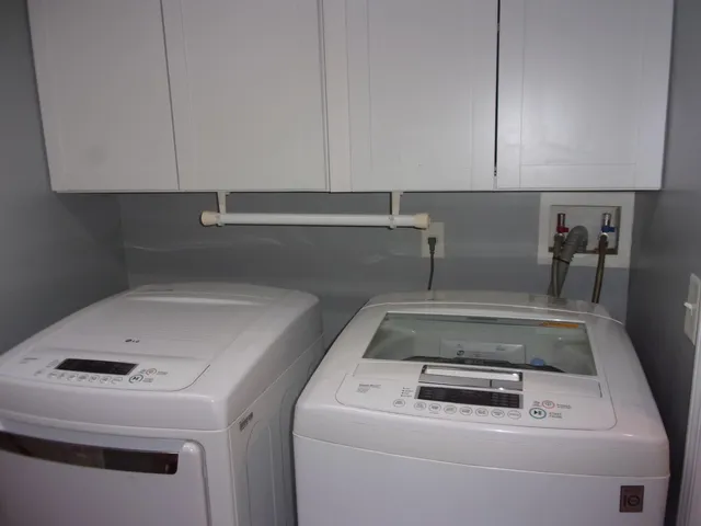 a utility room with dryer and washer