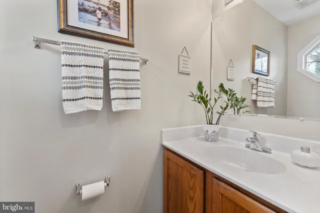 a bedroom with a bed and flat screen tv