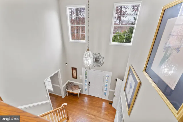 a bathroom with a sink a large mirror and a bathtub