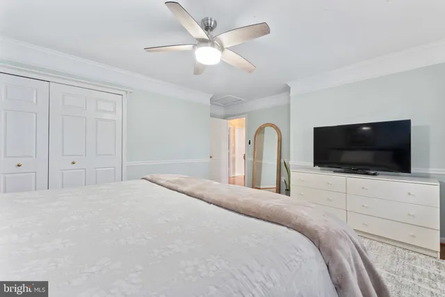 a work room with furniture and wooden floor