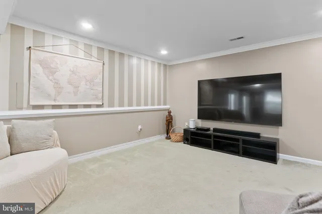 a spacious bathroom with a double vanity sink mirror and shower