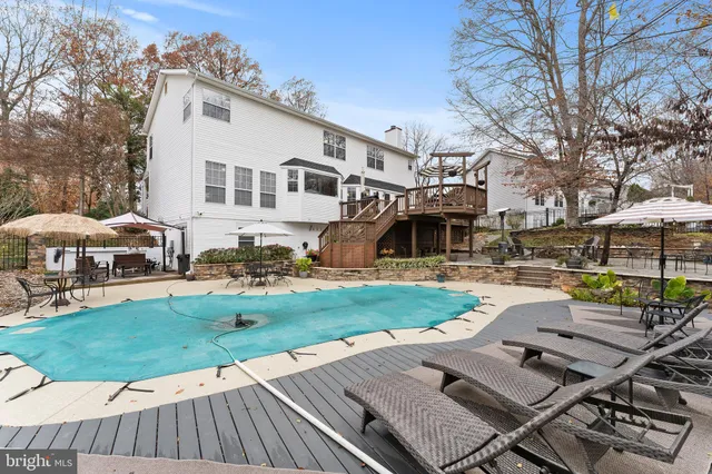 a view of a chairs and table in patio
