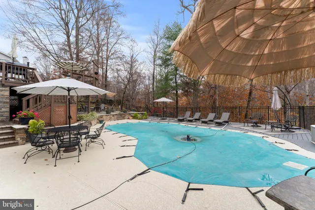 a view of balcony with furniture