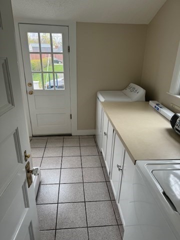 7 Lowell Street, Unit A Woburn, MA 01801 - Photo 14 of 17 a view of a livingroom with white furniture