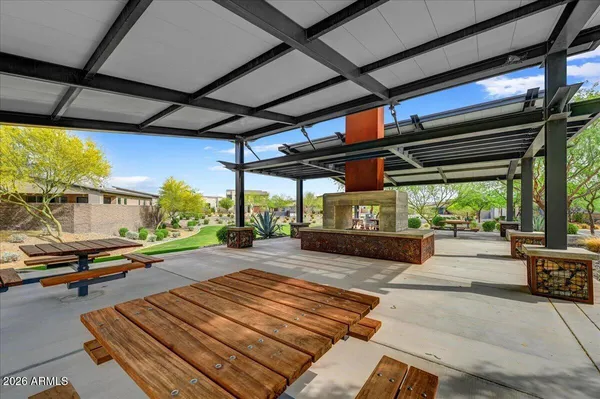 a view of a patio with a yard