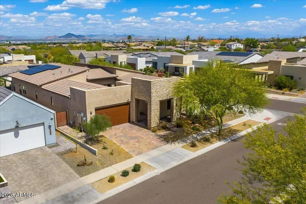 a view of a house with a ocean view