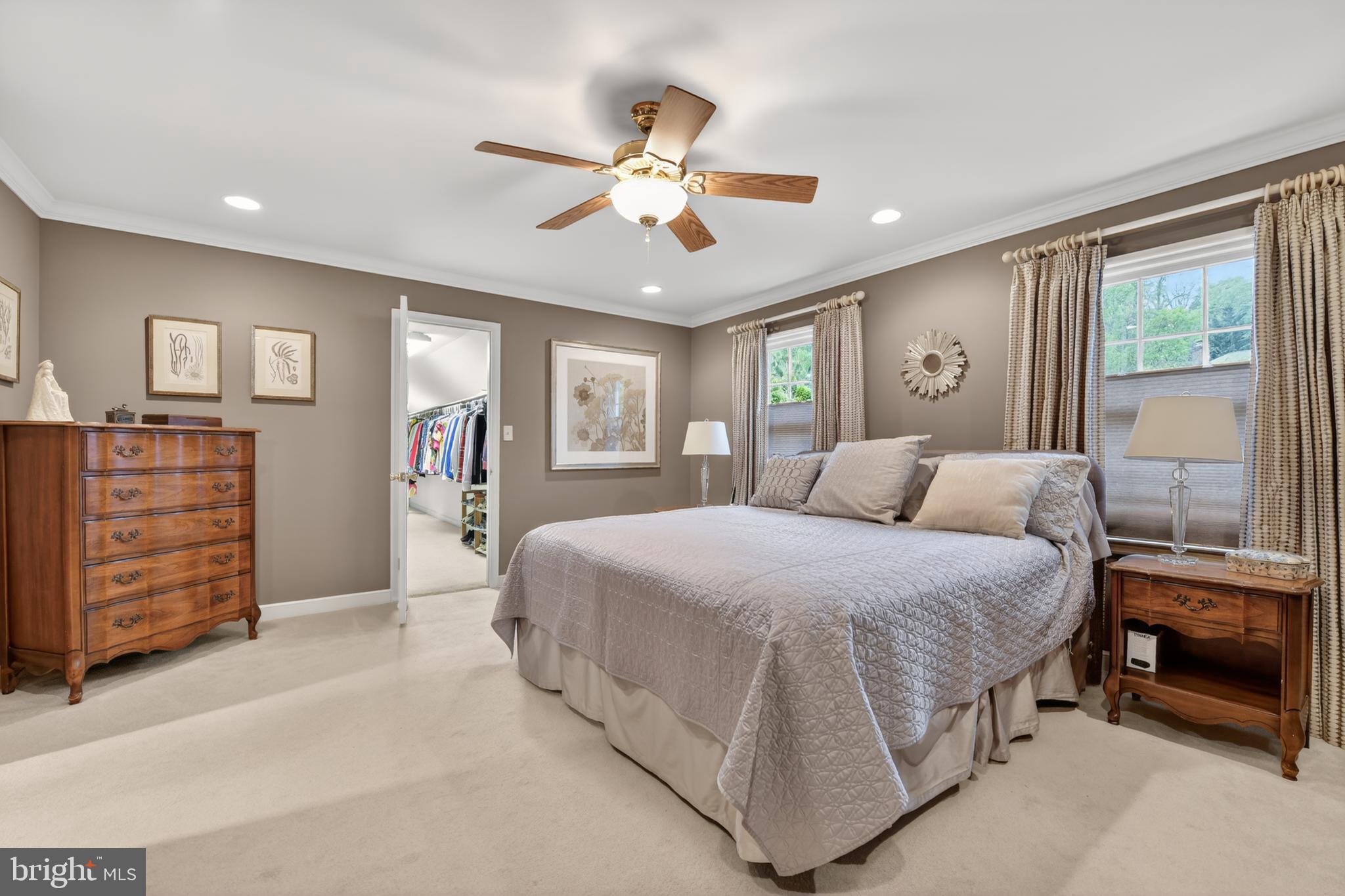 100 Deborah Drive Reading, PA 19610 - Photo 21 of 50 a spacious bedroom with a large bed and a chandelier