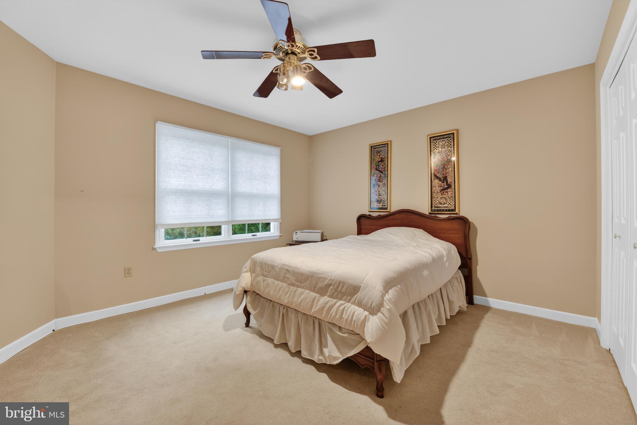 100 Deborah Drive Reading, PA 19610 - Photo 26 of 50 a spacious bedroom with a bed and a window