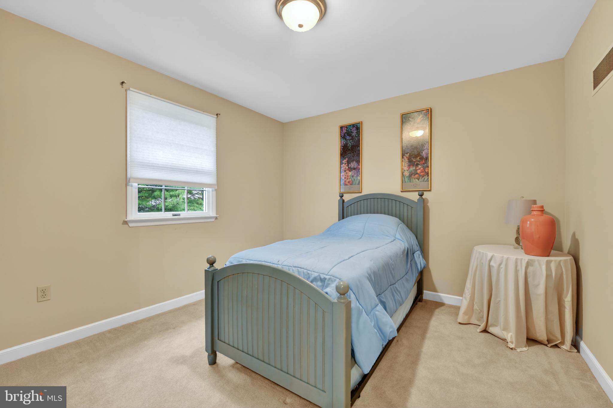 100 Deborah Drive Reading, PA 19610 - Photo 29 of 50 a bedroom with a bed and a window