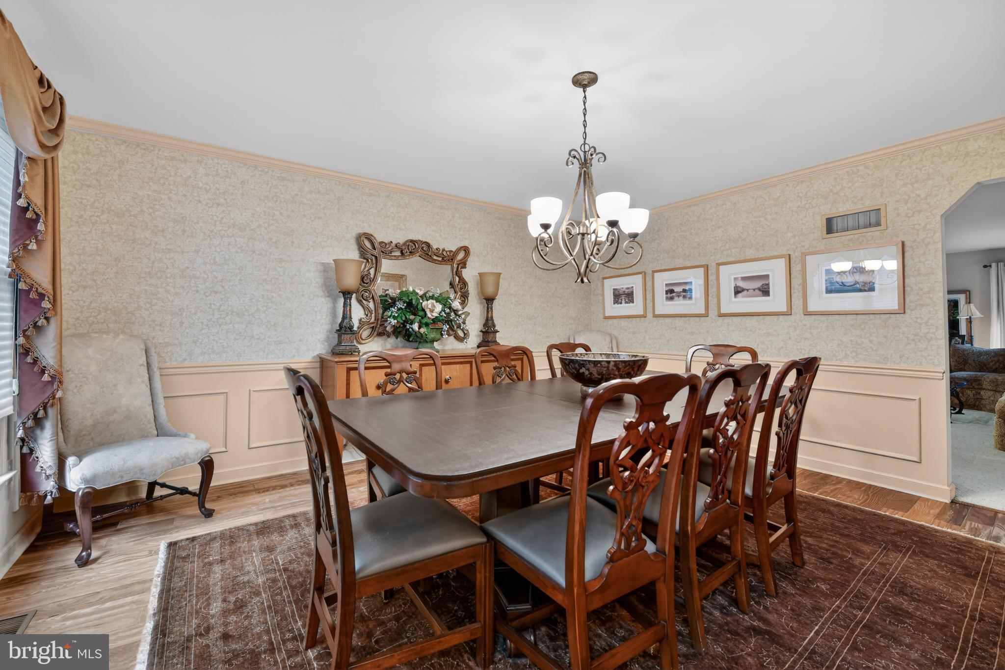100 Deborah Drive Reading, PA 19610 - Photo 8 of 50 a dining room with furniture a chandelier and wooden floor
