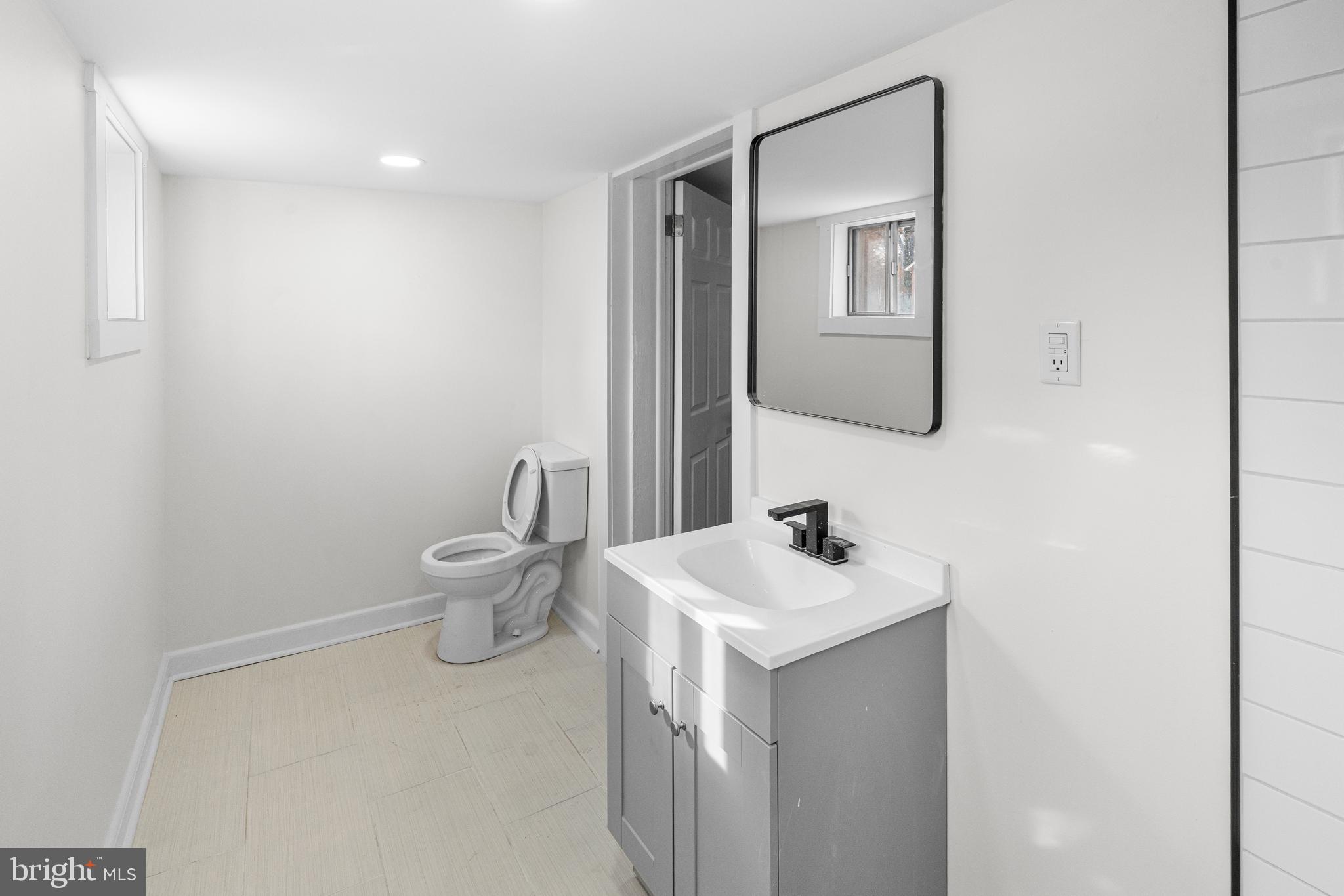 3500 Eisenbrown Road Reading, PA 19605 - Photo 27 of 34 a bathroom with a toilet sink and mirror