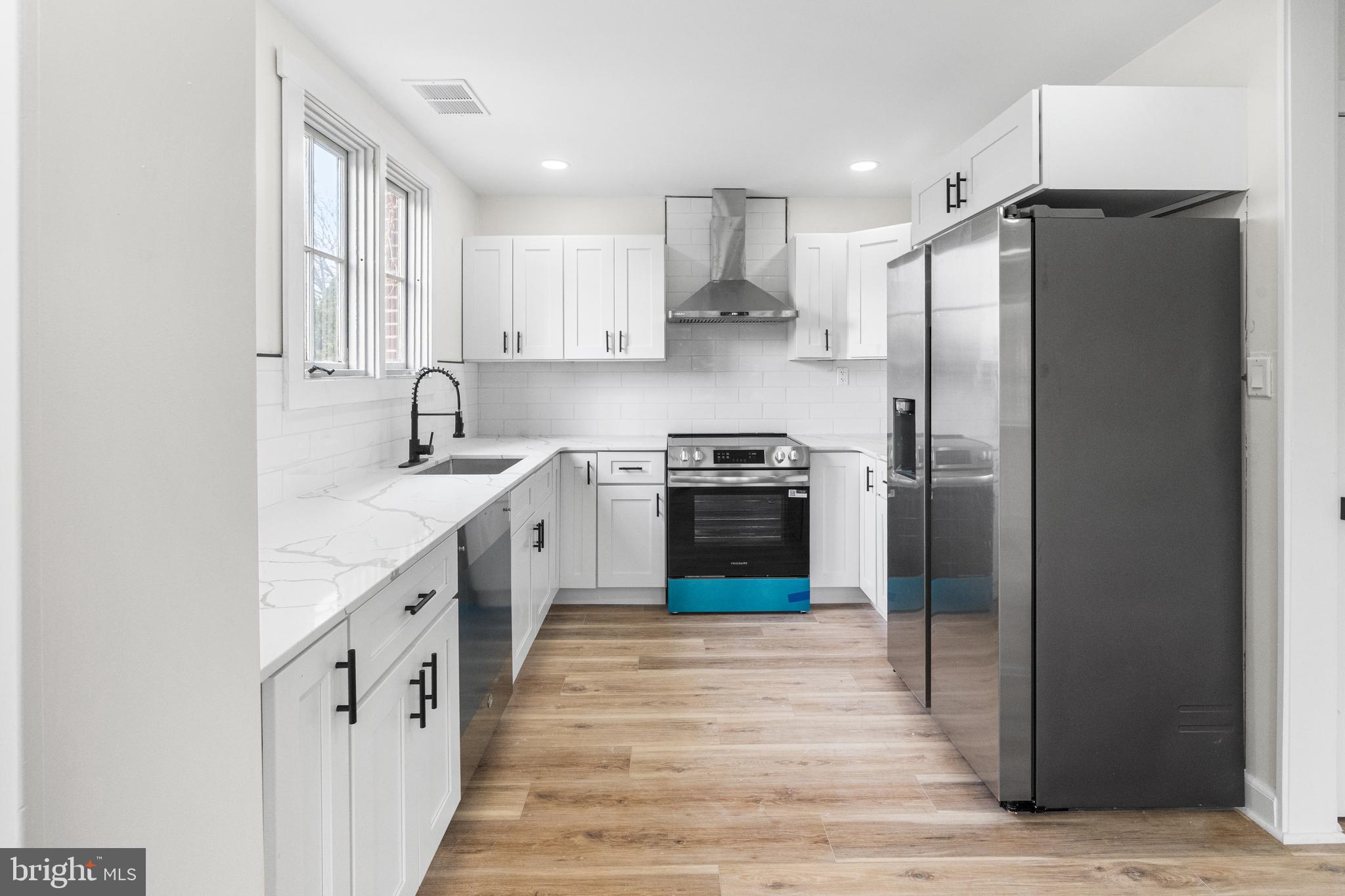 3500 Eisenbrown Road Reading, PA 19605 - Photo 6 of 34 a kitchen with stainless steel appliances granite countertop a refrigerator a sink and a stove