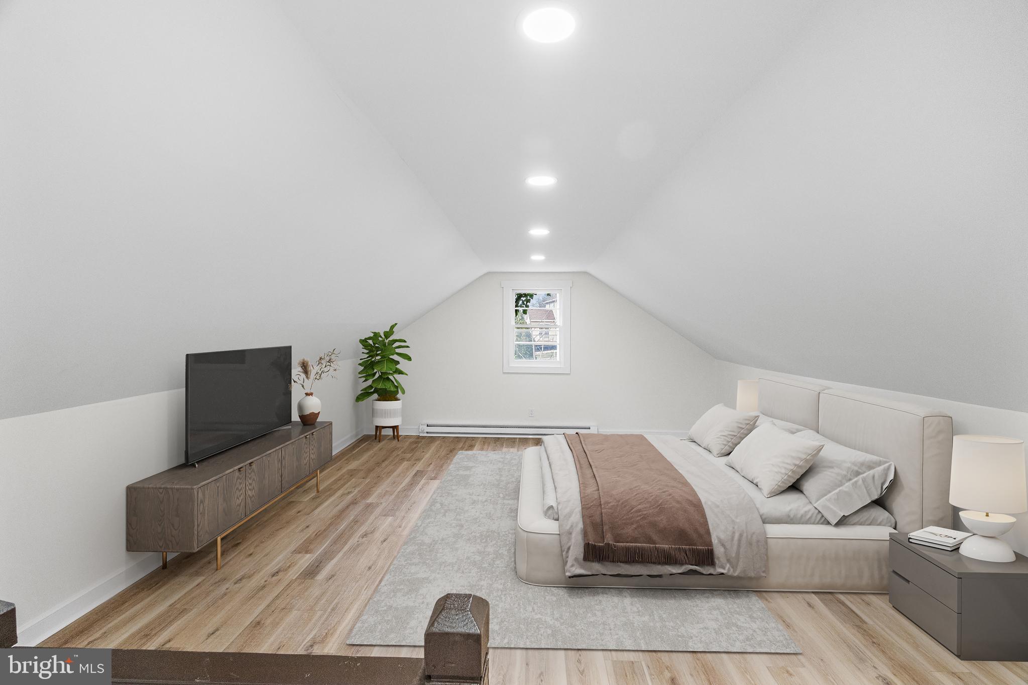 3500 Eisenbrown Road Reading, PA 19605 - Photo 9 of 34 a spacious bedroom with a bed and a couch