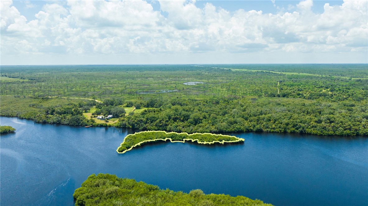 None Islands Melbourne, FL 32901 - Photo 7 of 8 a view of a lake with a car parked