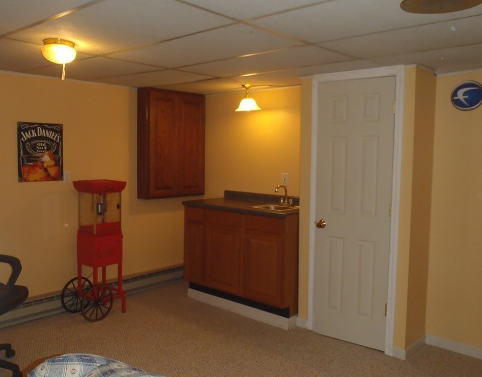 19 Wilbraham Road Monson, MA 01057 - Photo 23 of 29 a room with furniture and gym equipment