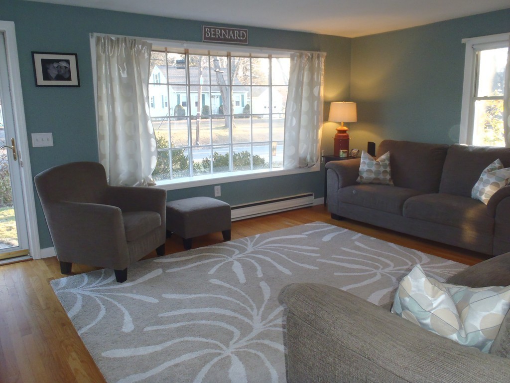19 Wilbraham Road Monson, MA 01057 - Photo 3 of 29 a living room with furniture and a large window