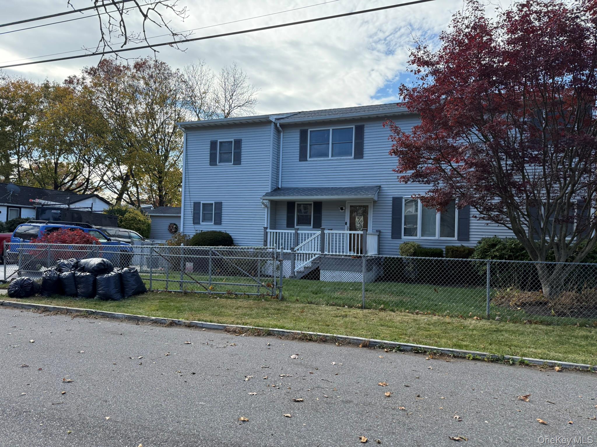 a view of a yard in front of a house