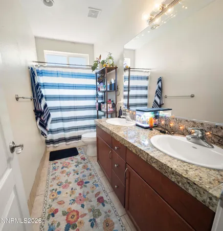 a room with a bed and a window