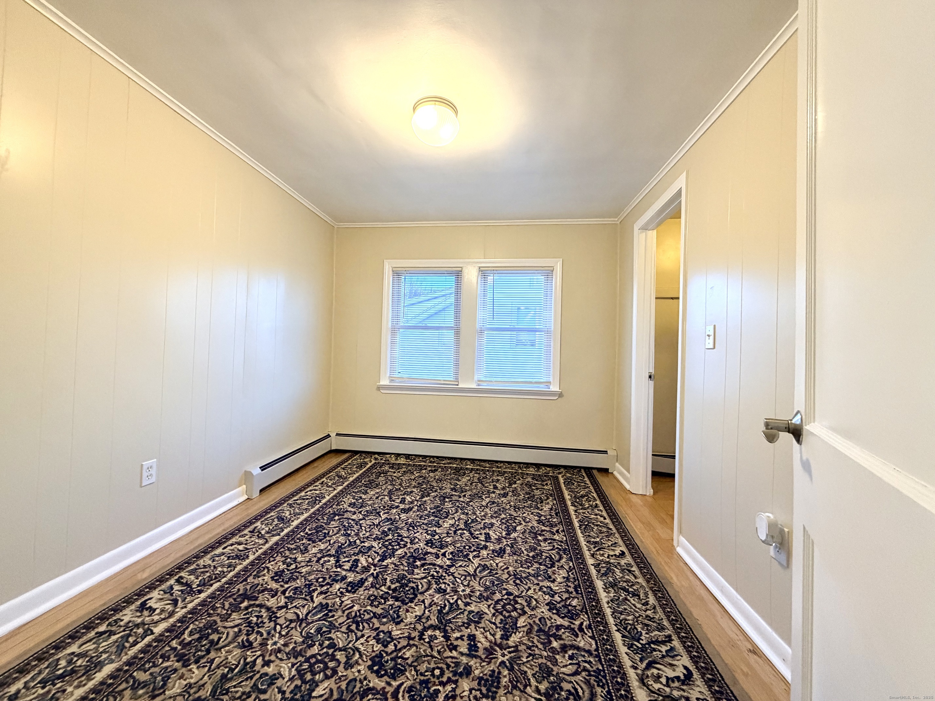 12 Clark Lane, Unit A Waterford, CT 06385 - Photo 10 of 20 a view of an empty room and window