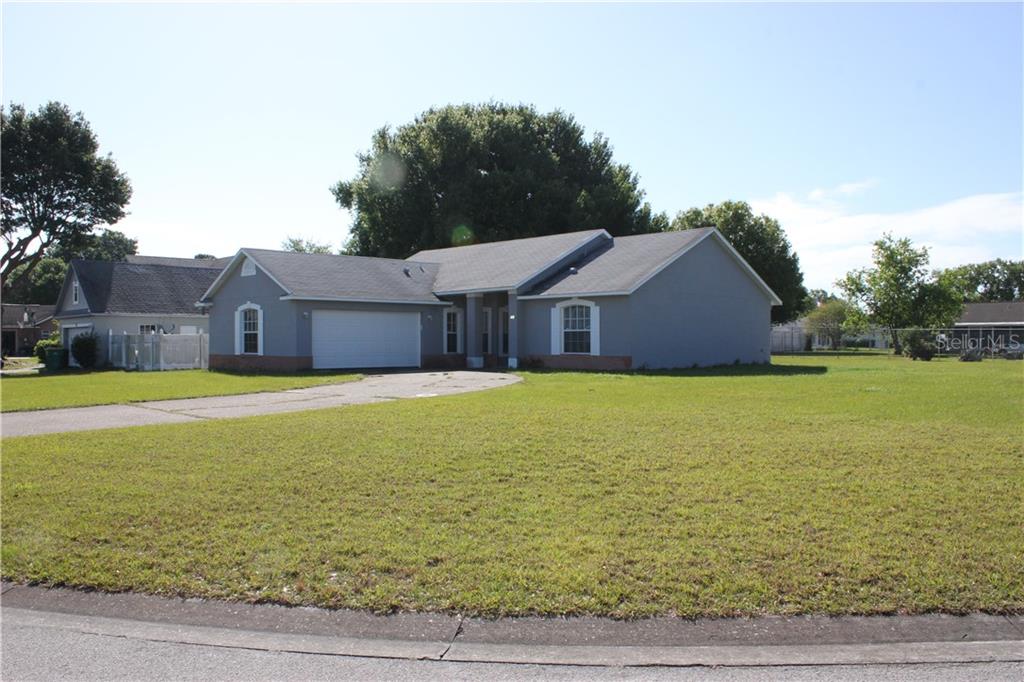 a front view of a house with swimming pool