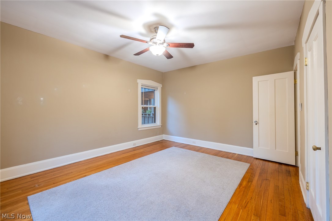 2472 Overlook Road Cleveland Heights, OH 44106 - Photo 19 of 30 Spare room featuring light wood flooring and ceiling fan