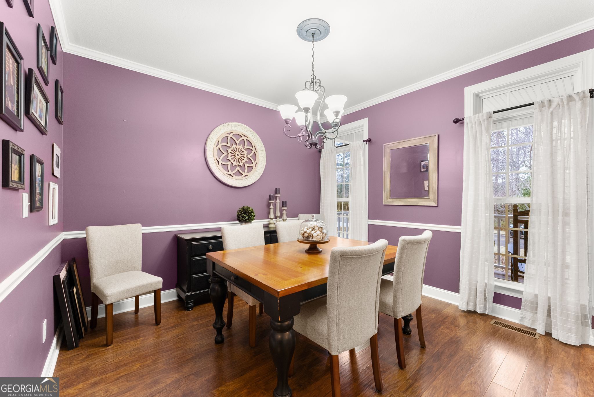 96 Magnolia Place Commerce, GA 30529 - Photo 11 of 58 a view of a dining room with furniture and wooden floor