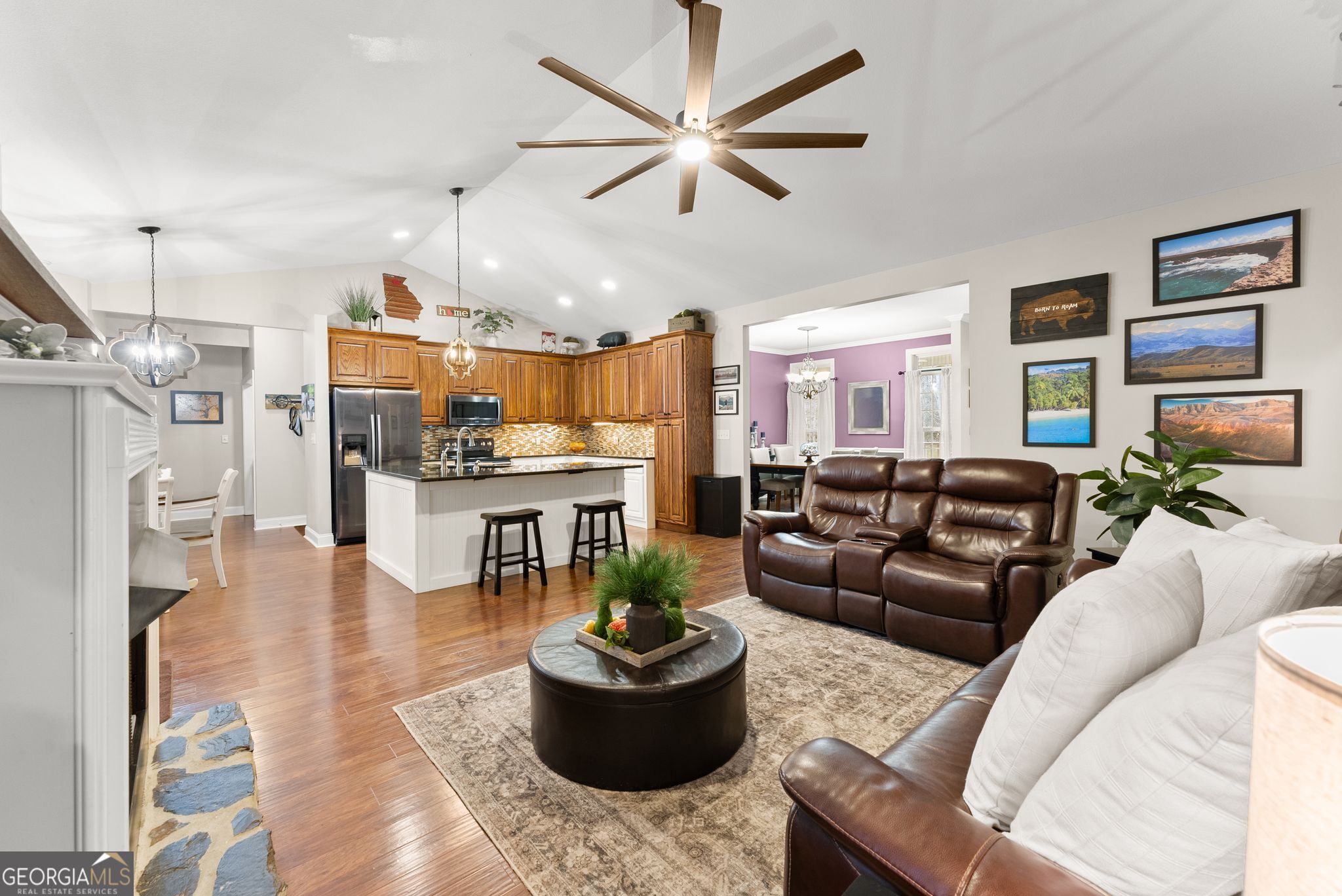 96 Magnolia Place Commerce, GA 30529 - Photo 14 of 58 a living room with furniture and kitchen view