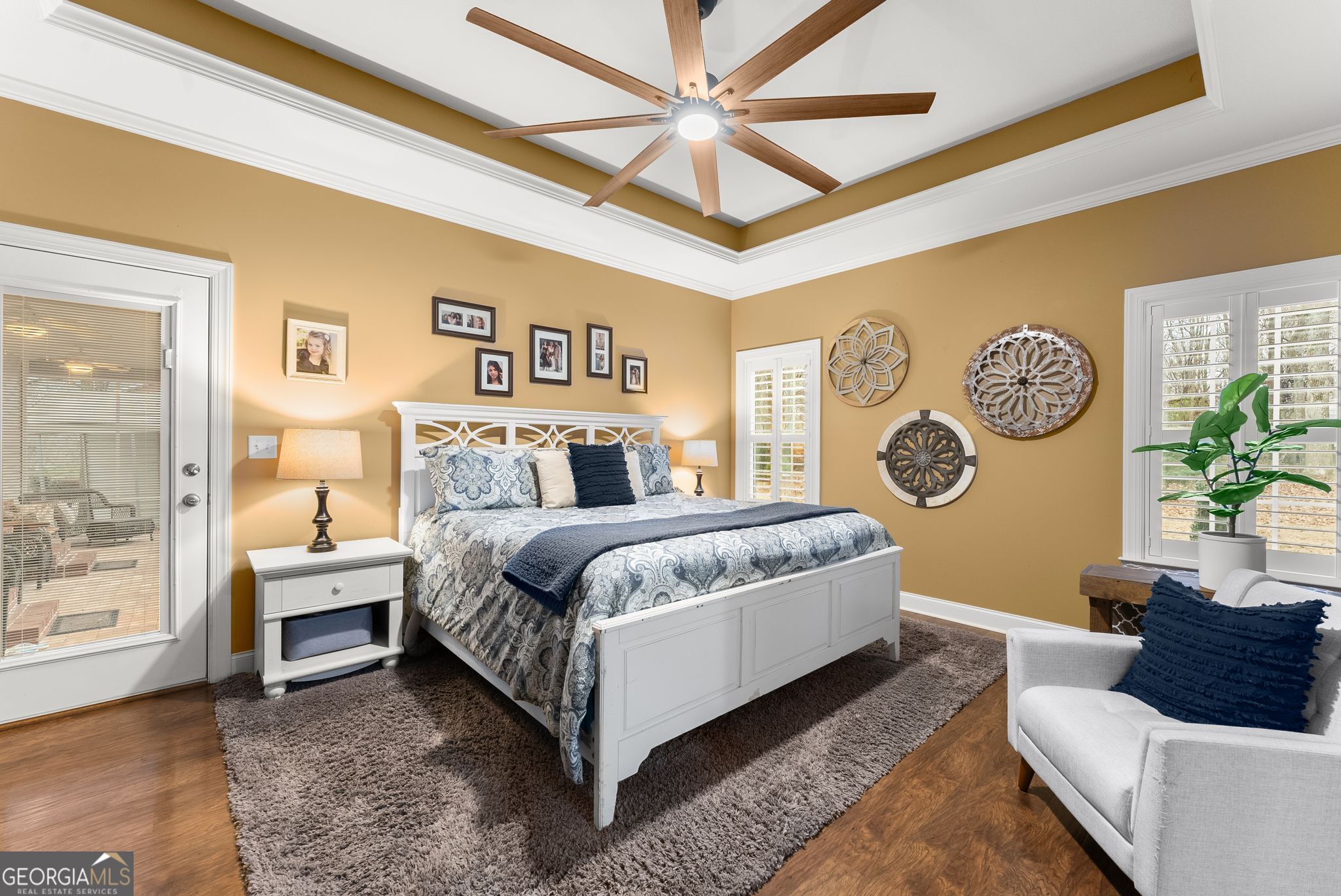 96 Magnolia Place Commerce, GA 30529 - Photo 21 of 58 a bedroom with a bed couch and a window