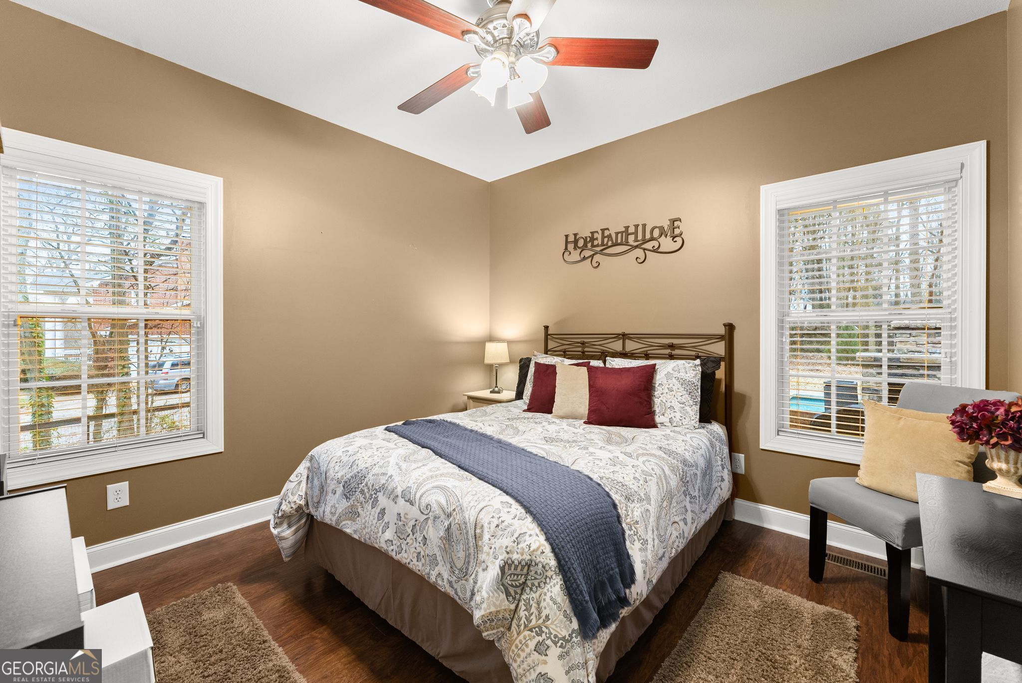 96 Magnolia Place Commerce, GA 30529 - Photo 28 of 58 a bedroom with a large bed and a window