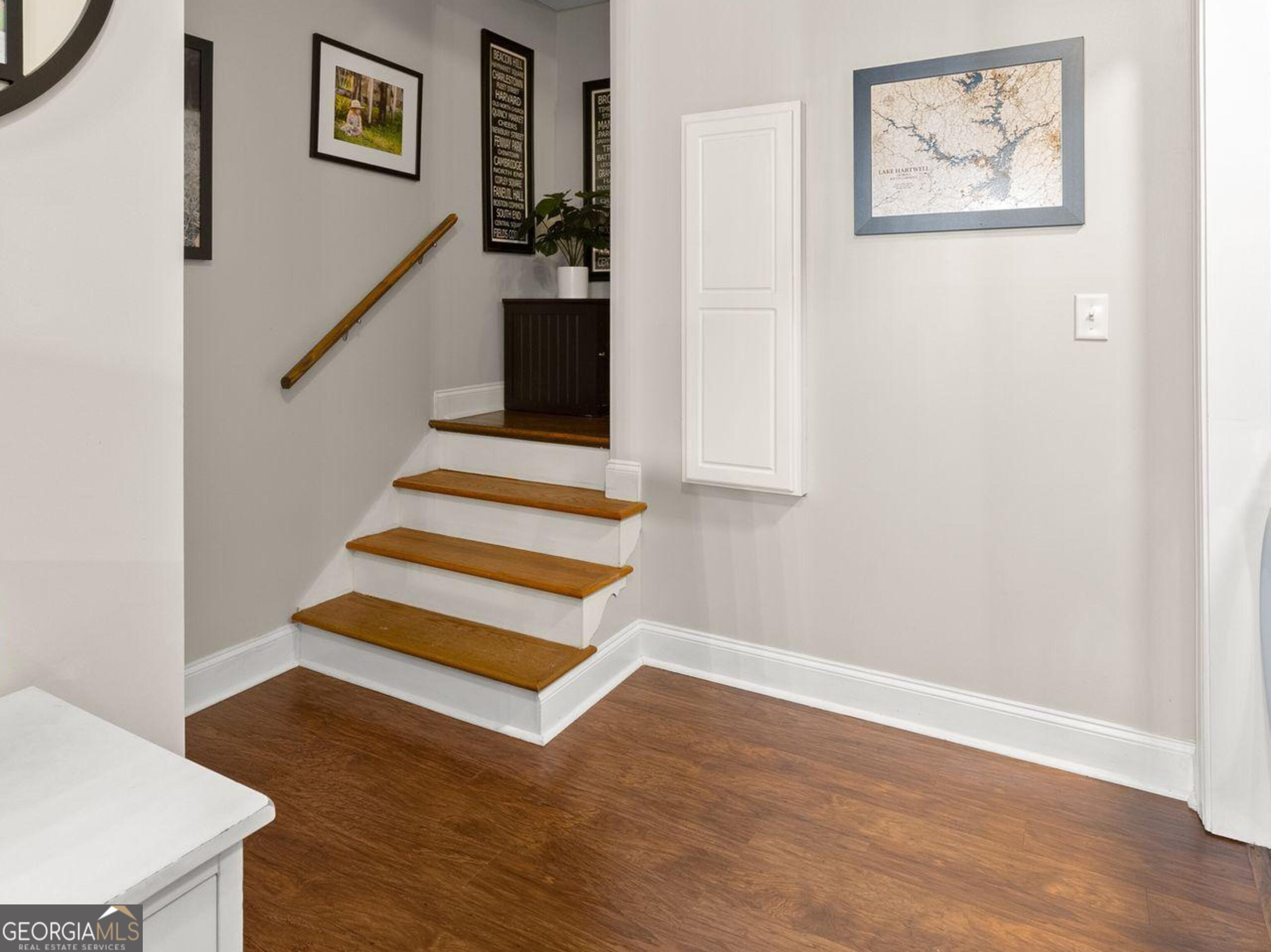 96 Magnolia Place Commerce, GA 30529 - Photo 29 of 58 a view of entryway and hall with wooden floor