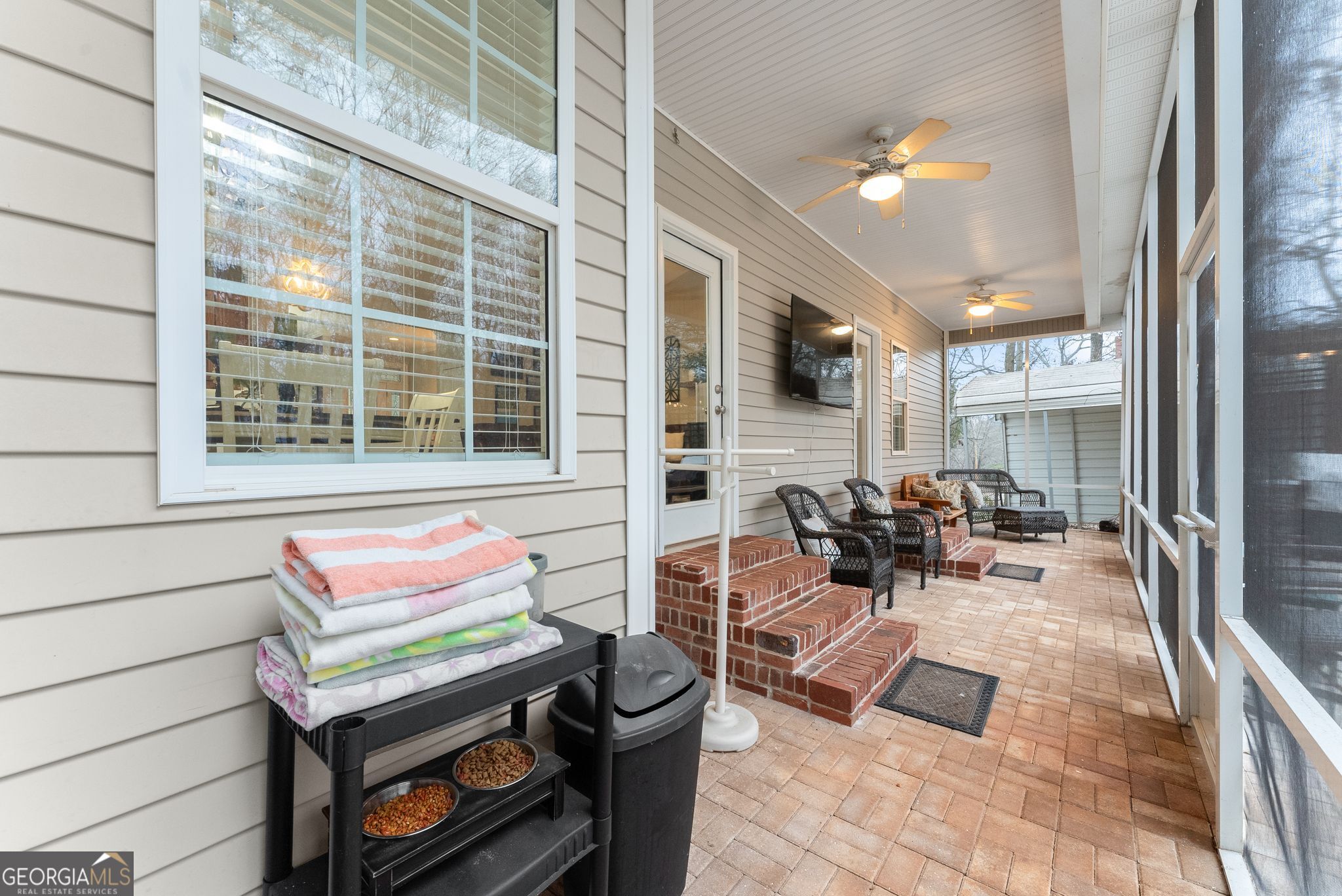 96 Magnolia Place Commerce, GA 30529 - Photo 32 of 58 a building outdoor space with patio furniture and potted plants