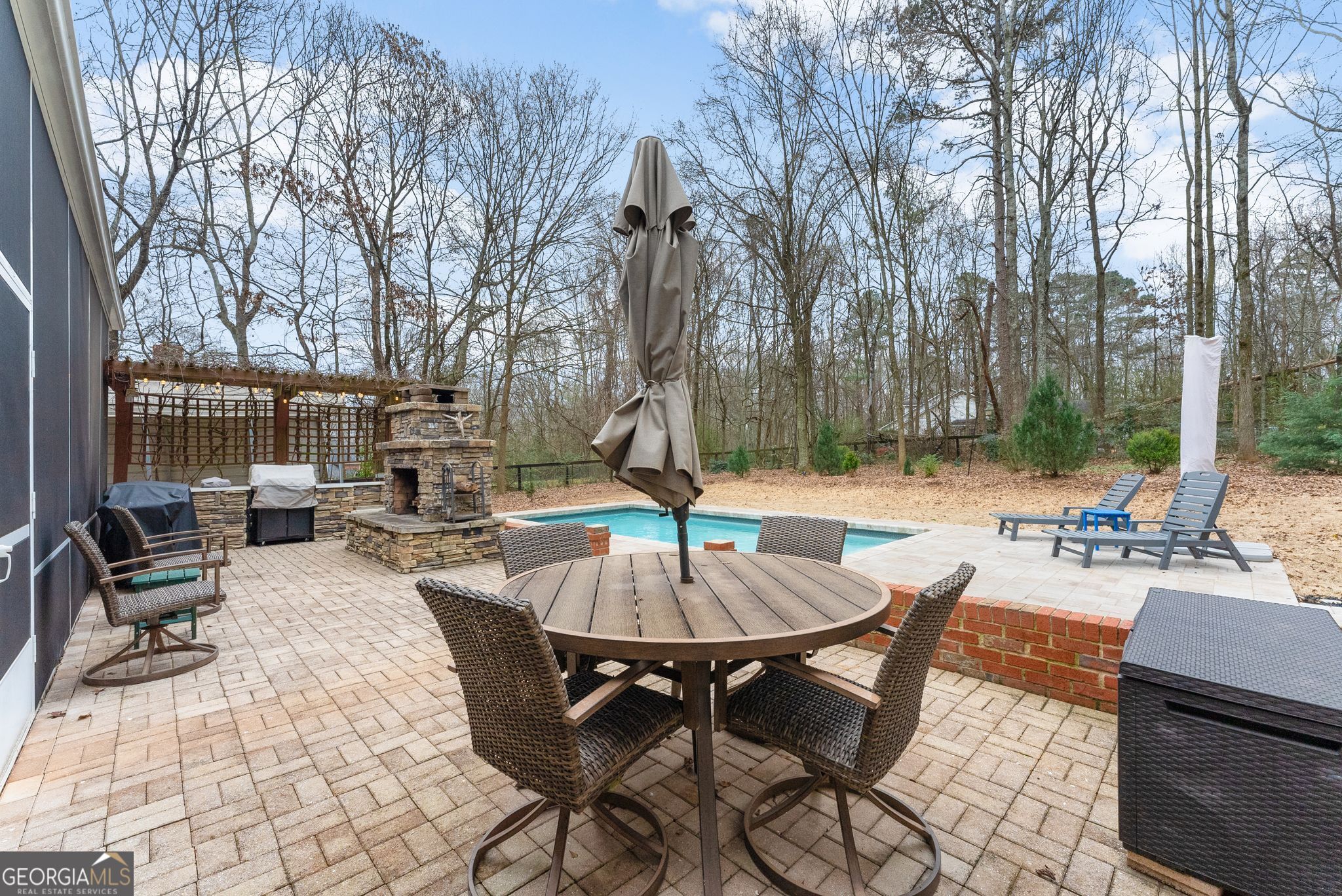 96 Magnolia Place Commerce, GA 30529 - Photo 34 of 58 a view of a patio with a yard