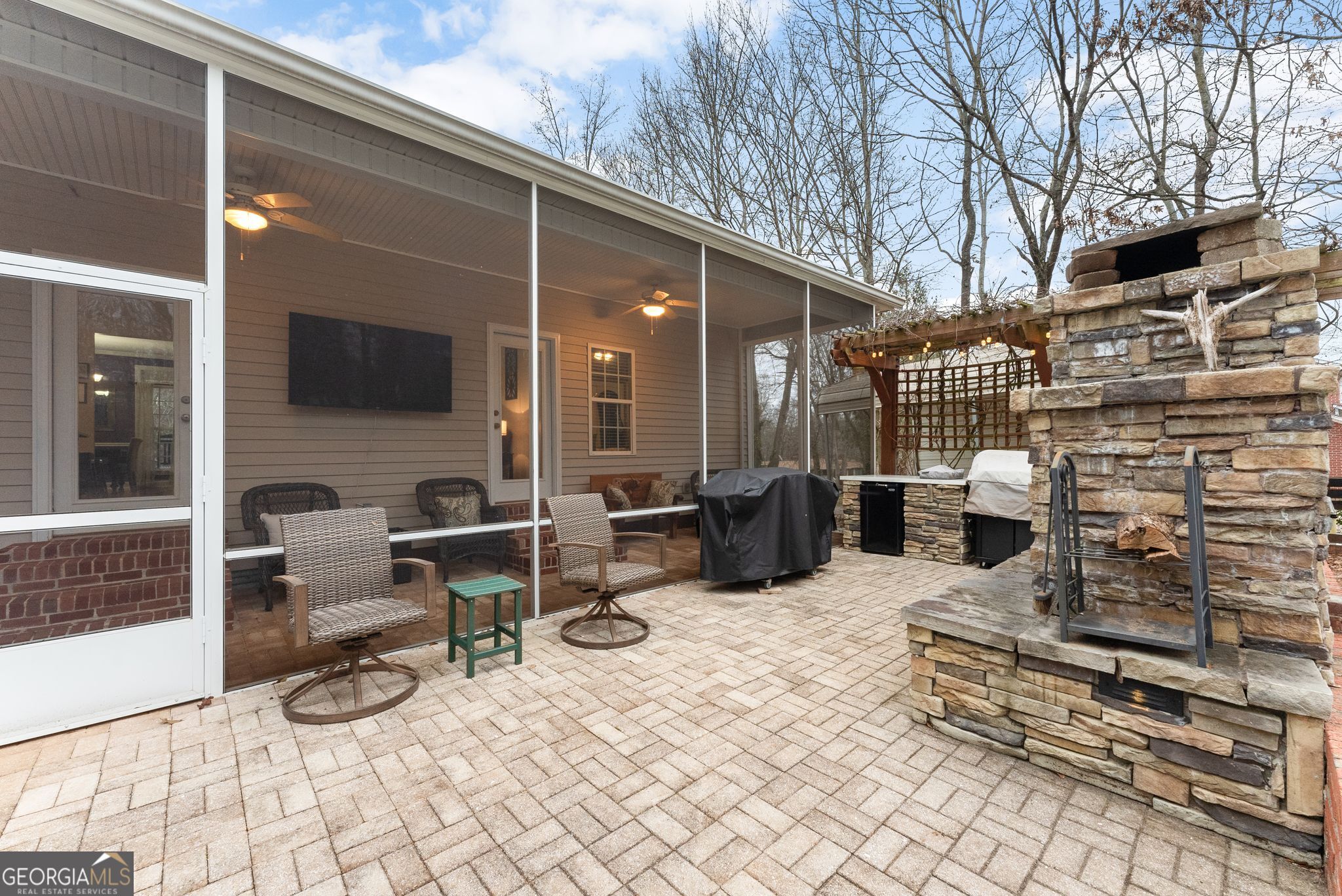 96 Magnolia Place Commerce, GA 30529 - Photo 36 of 58 a view of a chairs and tables in the patio