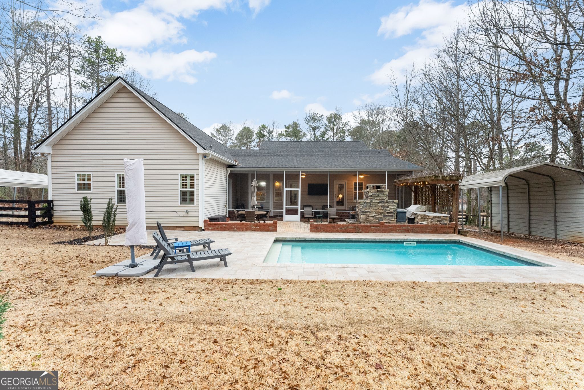 96 Magnolia Place Commerce, GA 30529 - Photo 43 of 58 a view of a house with backyard porch and sitting area