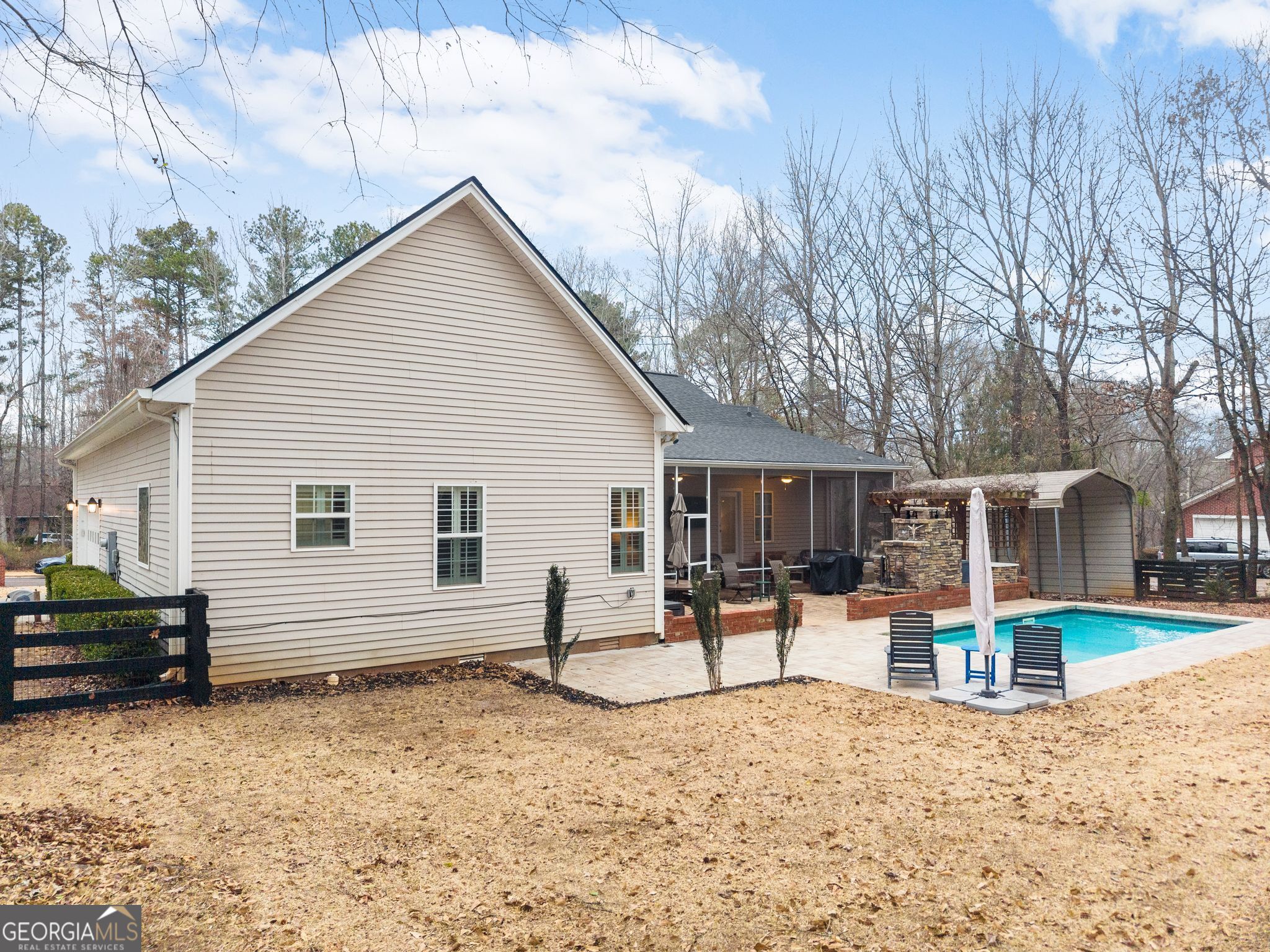96 Magnolia Place Commerce, GA 30529 - Photo 44 of 58 a view of a house with backyard and chairs