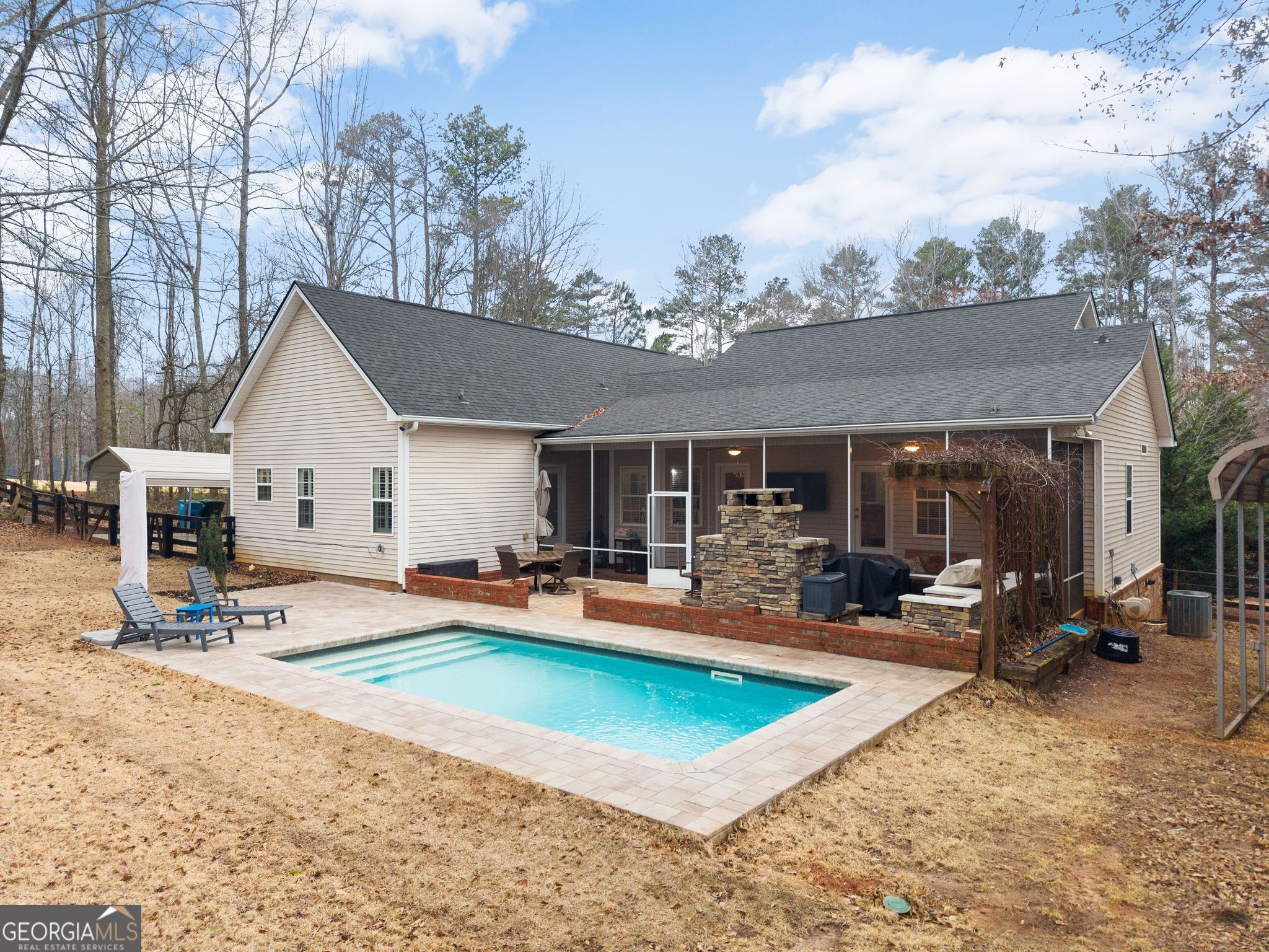 96 Magnolia Place Commerce, GA 30529 - Photo 45 of 58 a view of a house with swimming pool and sitting area