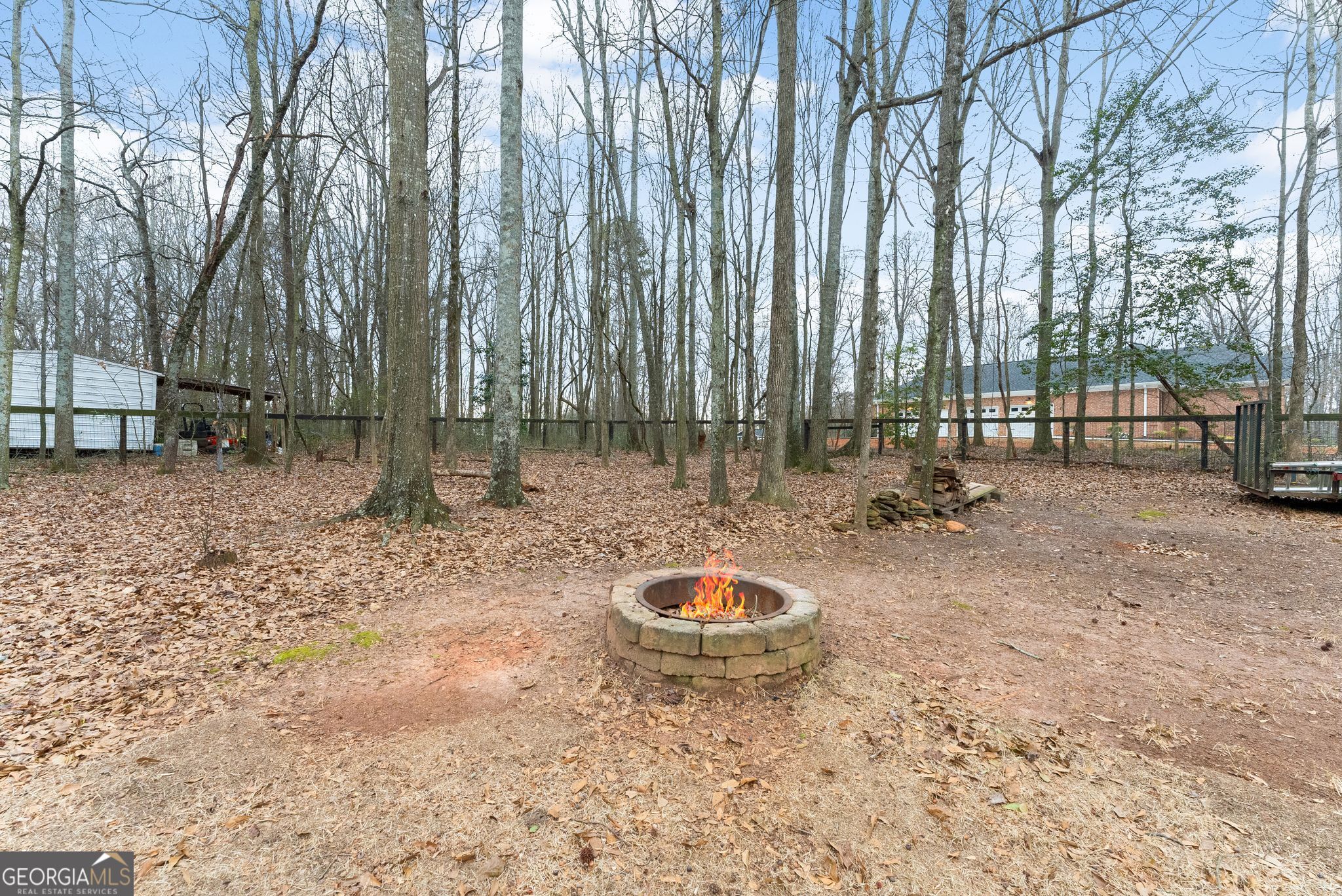 96 Magnolia Place Commerce, GA 30529 - Photo 46 of 58 a backyard of a house with lots of green space