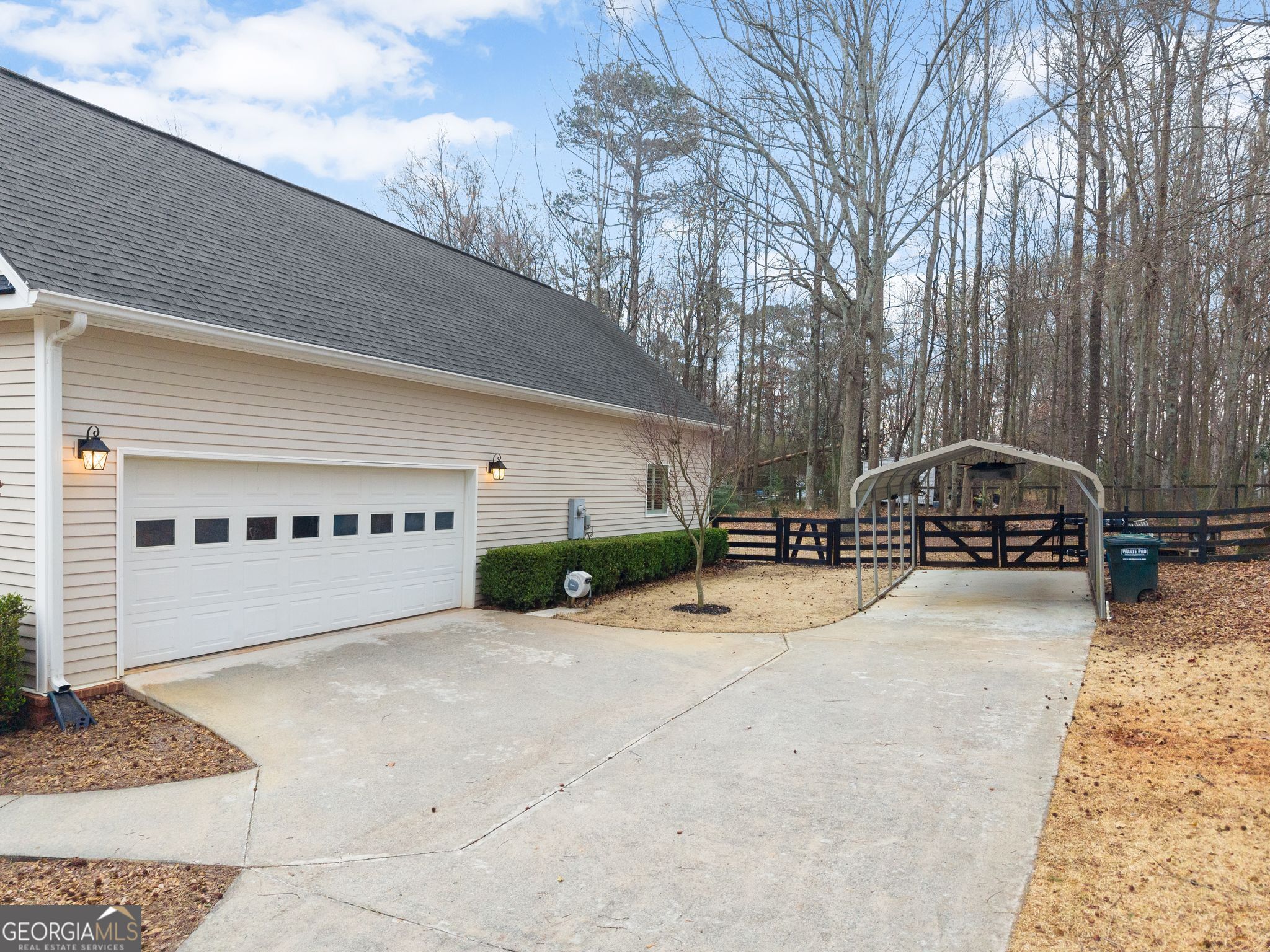 96 Magnolia Place Commerce, GA 30529 - Photo 48 of 58 a view of a house with a yard covered in snow