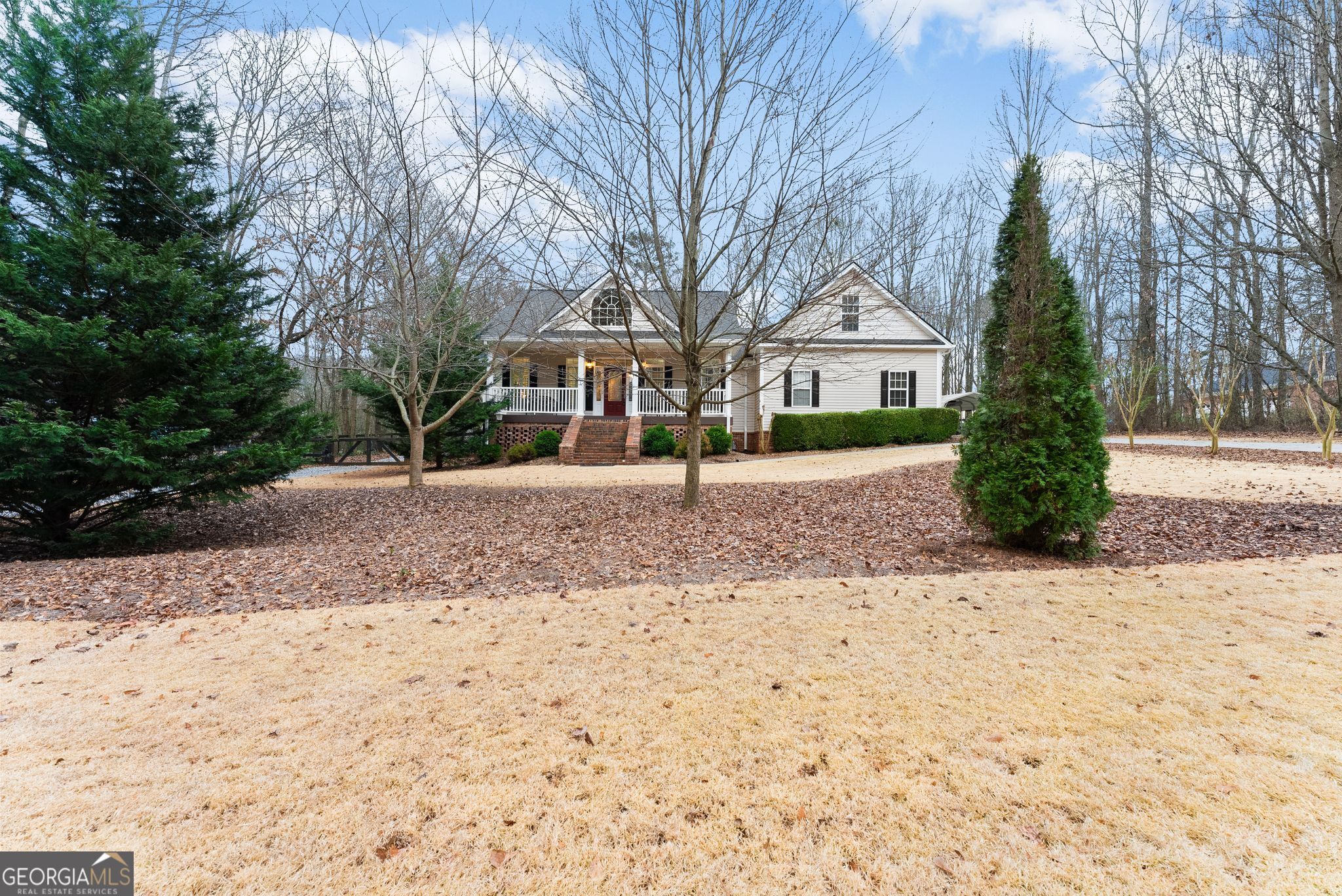 96 Magnolia Place Commerce, GA 30529 - Photo 7 of 58 a front view of a house with a yard