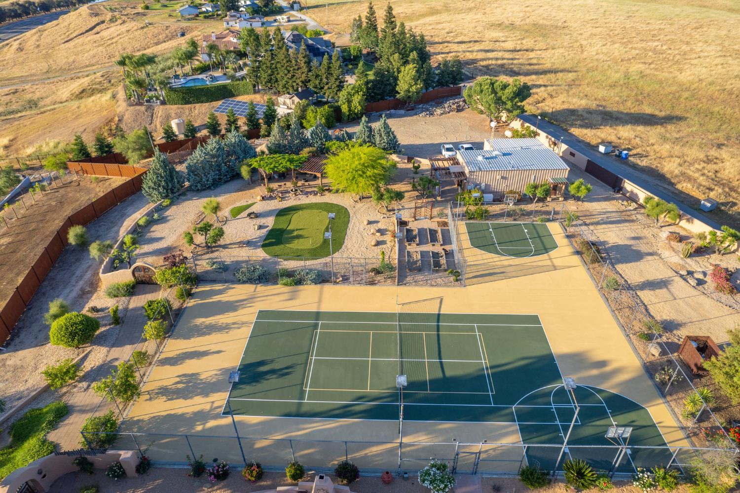 15516 North Friant Road Friant, CA 93626 - Photo 58 of 99 Recently resurfaced Tennis Court, Sport Court, and Putting Green