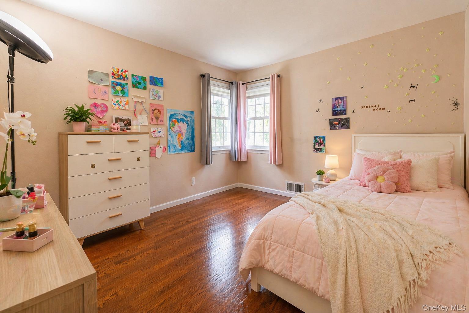 6 Huyler Road Setauket, NY 11733 - Photo 16 of 27 a bedroom with a bed and furniture